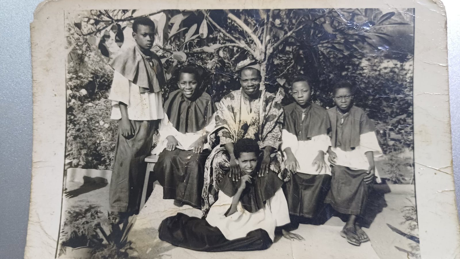 An old group photograph of young altar servers in cassocks and surplices, from Padre Mike’s archive